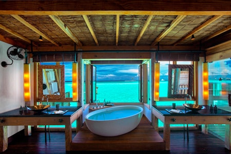 Villa bathroom with a view at Gili Lankanfushi, Maldives